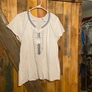 Wry light summer top with smocking and pretty embroidery detail